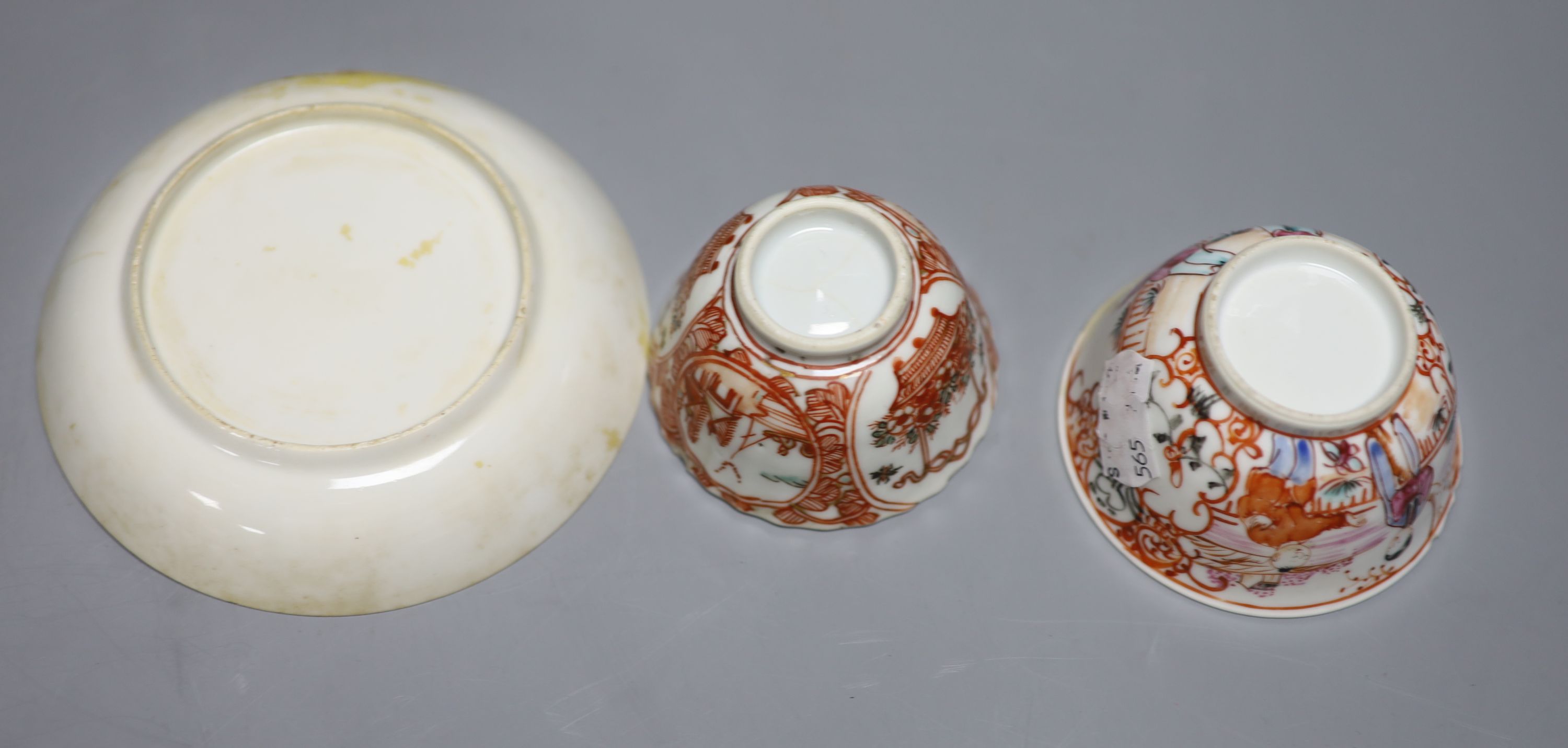 A pair of Chinese famille rose saucers, another saucer, three various tea bowls and a crackleglaze vase (7)